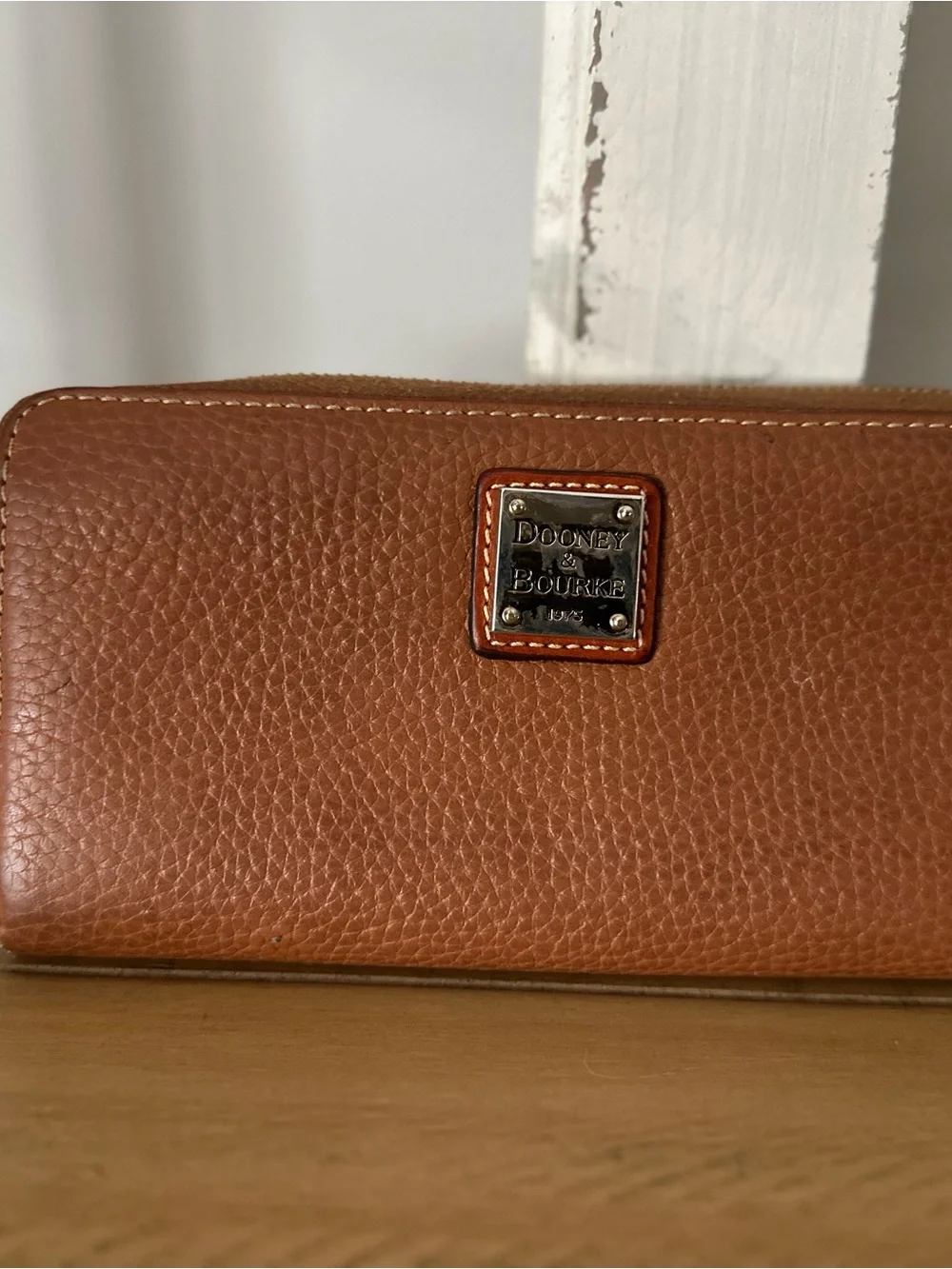 Dooney & Bourke Pebble Leather Zip Wallet in Brown